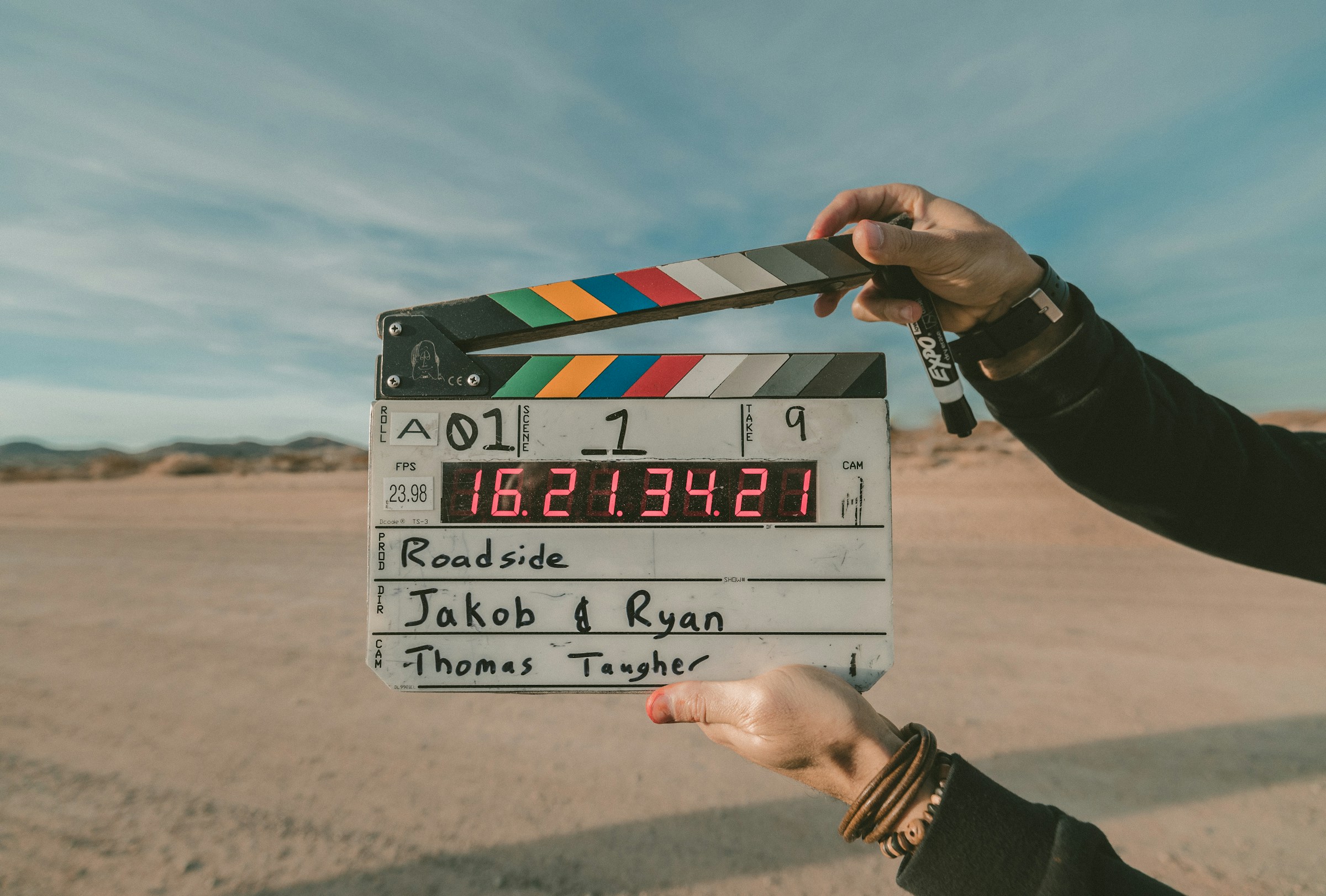 Film clapperboard on set — Creator Collective production